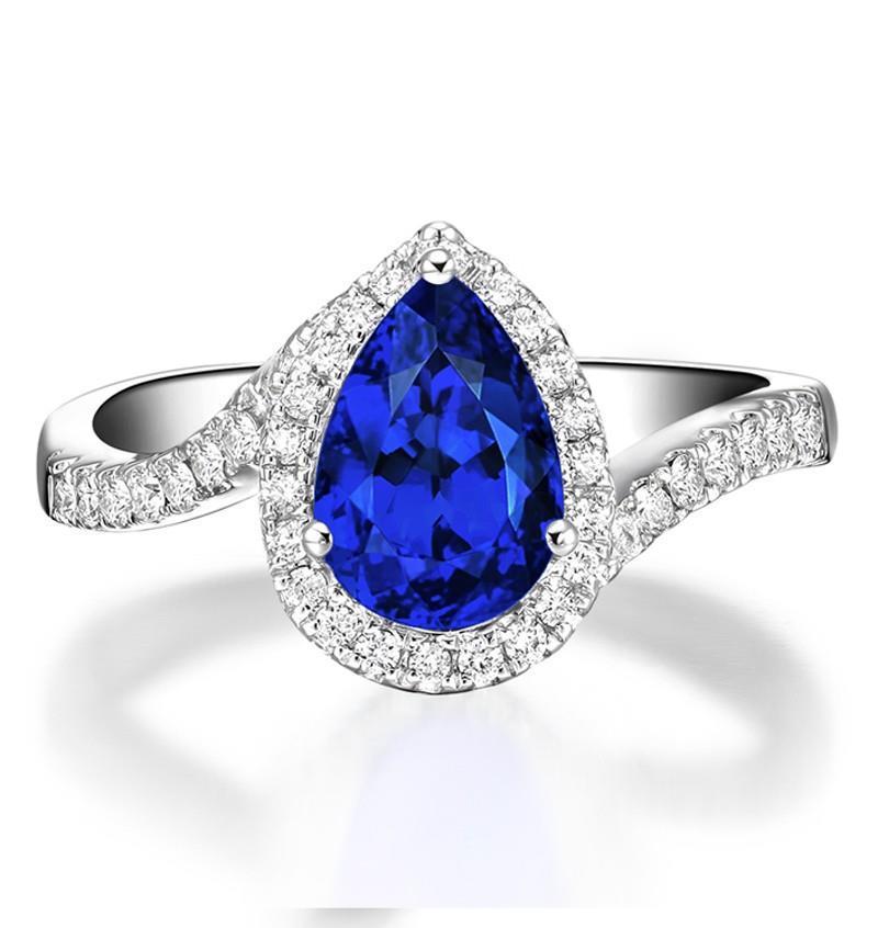 Pear and round cut CEYLON sapphire with diamonds 3.70 ct. ring 14k gold